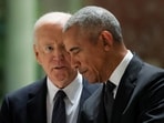 Joe Biden and former President Barack Obama talk at the memorial service for Ethel Kennedy 