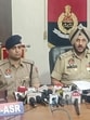 Police commissioner Gurpreet Singh Bhullar (centre) addressing a press conference in Amritsar on Friday. (Sameer Sehgal/HT)