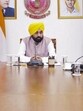 Punjab chief minister Bhagwant Mann during the meeting with top officials of Punjab Police to review security at Golden Temple. (PTI)