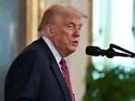 President Donald Trump speaks during a signing ceremony for the "Genius Act"