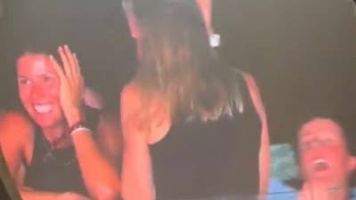 A third person in the Andy Byron-Kristin Cabot Coldplay kiss cam video has gone viral for her “stunned expression.” (X) A third person in the Andy Byron-Kristin Cabot Coldplay kiss cam video has gone viral for her “stunned expression.” (X)
