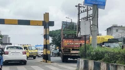Heavy vehicles have found a way to bypass the height barrier by manoeuvring through a diagonal route. (HT PHOTO)