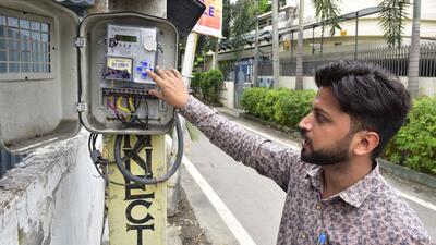Ludhiana, India – July 23, 2021 : Shiv Kumar SDO commercial in PSPCL showing the smart electricity meters installed in Rani Jhansi road in Ludhiana on Friday, July 23, 2021. (Photo by Harsimar Pal Singh/Hindustan Times) Ludhiana, India – July 23, 2021 : Shiv Kumar SDO commercial in PSPCL showing the smart electricity meters installed in Rani Jhansi road in Ludhiana on Friday, July 23, 2021. (Photo by Harsimar Pal Singh/Hindustan Times)