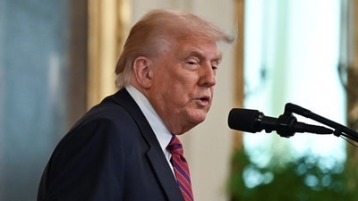 President Donald Trump speaks during a signing ceremony for the "Genius Act" (REUTERS)