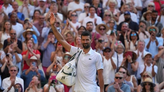 Novak Djokovic waves to Wimbledon's Centre Court after his loss to Jannik Sinner. (AP)