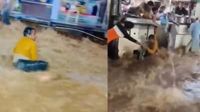 The man, who was holding a water bottle, was swept away by the current of the floodwaters. (X) The man, who was holding a water bottle, was swept away by the current of the floodwaters. (X)