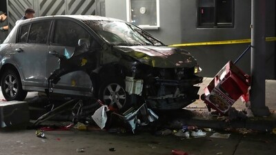 A vehicle sits on the sidewalk after ramming into a crowd of people waiting to enter a nightclub along a busy boulevard in Los Angeles early Saturday. (AP) A vehicle sits on the sidewalk after ramming into a crowd of people waiting to enter a nightclub along a busy boulevard in Los Angeles early Saturday. (AP)