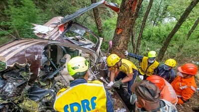 SDRF personnel carry out rescue work after a helicopter carrying six people to Gangotri Dham crashed near Gangnani in Uttarkashi district. (PTI File) SDRF personnel carry out rescue work after a helicopter carrying six people to Gangotri Dham crashed near Gangnani in Uttarkashi district. (PTI File)