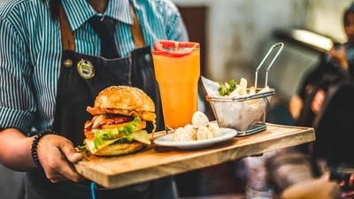 After returning from the UK, a Chinese woman took up flexible odd jobs, including waitressing, to fund her passion for acting. (Representational image/Unsplash) After returning from the UK, a Chinese woman took up flexible odd jobs, including waitressing, to fund her passion for acting. (Representational image/Unsplash)