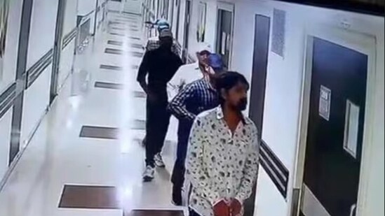 A chilling CCTV footage of several armed men entering a room to shoot Chandan Mishra also emerged from Patna's Paras Hospital. (CCTV grab/HT)