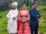 Bride Sunita Chauhan with grooms Pradeep and Kapil Negi during their traditional polyandrous wedding ceremony in Himachal’s Shillai village, attended by members of the Hatti tribe.