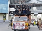 Kanwariyas carrying boomboxes in Ghaziabad on Saturday. (Sakib Ali/HT Photo)