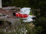 The tail of the Air India Boeing 787 Dreamliner was stuck on the hostel building after a crash in Ahmedabad.