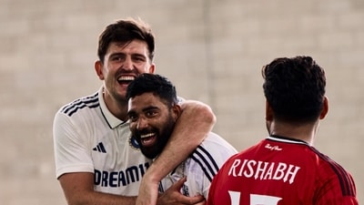 Harry Maguire and Mohammed Siraj have a moment together. (X) Harry Maguire and Mohammed Siraj have a moment together. (X)