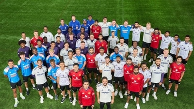 Team India players and Manchester United get a group photo together. (X) Team India players and Manchester United get a group photo together. (X)