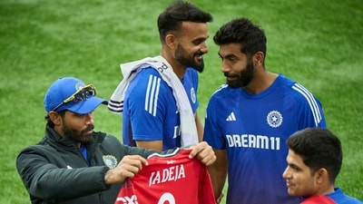Ravindra Jadeja checks his Manchester United jersey. (X) Ravindra Jadeja checks his Manchester United jersey. (X)