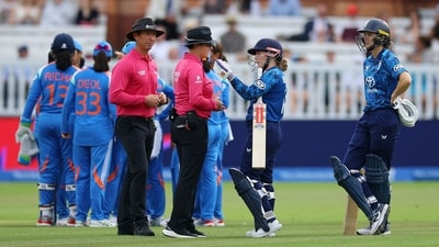 England's Tammy Beaumont speaks to the umpire after India appeal for obstructing the field. (Action Images via Reuters)
