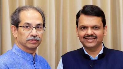 Shiv Sena (UBT) Chief Uddhav Thackeray presents the book 'Why Do You Want Hindi?' compiled by various editors across the state against the compulsory implementation of Hindi, to state Chief Minister Devendra Fadnavis, at Vidhan Bhavan in Mumbai on Thursday. (X/ShivSena UBT) Shiv Sena (UBT) Chief Uddhav Thackeray presents the book 'Why Do You Want Hindi?' compiled by various editors across the state against the compulsory implementation of Hindi, to state Chief Minister Devendra Fadnavis, at Vidhan Bhavan in Mumbai on Thursday. (X/ShivSena UBT)