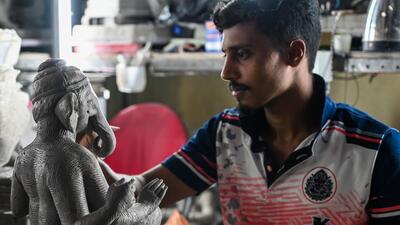 Mumbai artists are creating eco-friendly Ganesh idols at Nilesh Niwate`s workshop in Mazgaon. They use clay to build these non-polluting idols. (Photo by Raju Shinde/HT Photo) (Raju Shinde) Mumbai artists are creating eco-friendly Ganesh idols at Nilesh Niwate`s workshop in Mazgaon. They use clay to build these non-polluting idols. (Photo by Raju Shinde/HT Photo) (Raju Shinde)