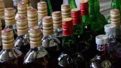 Navi Mumbai : Police showing duplicate liquor bottles seized after the arrest of two persons involved in manufacturing of spurious alcohol, at Panvel in Navi Mumbai on Thursday. PTI Photo (PTI2_4_2016_000158B) (PTI) Navi Mumbai : Police showing duplicate liquor bottles seized after the arrest of two persons involved in manufacturing of spurious alcohol, at Panvel in Navi Mumbai on Thursday. PTI Photo (PTI2_4_2016_000158B) (PTI)