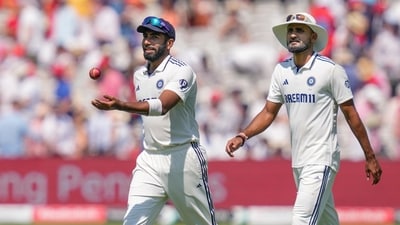 Jasprit Bumrah and Akash Deep return to pavilion after the end of England's first innings of the third Test cricket match at Lord's (PTI)