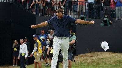 Scottie Scheffler of the U.S. celebrates on the 18th green after winning The 153rd Open Championship (REUTERS)