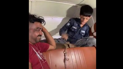 The accused Sohail Hasan Khan is seen laughing as his dog attacks the boy in Mankhurd area. (VideoGrab) The accused Sohail Hasan Khan is seen laughing as his dog attacks the boy in Mankhurd area. (VideoGrab)