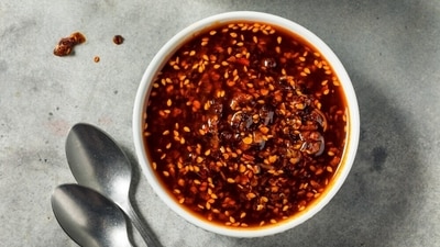 Hot chilli oil is used both as a condiment and an ingredient. (Shutterstock) Hot chilli oil is used both as a condiment and an ingredient. (Shutterstock)