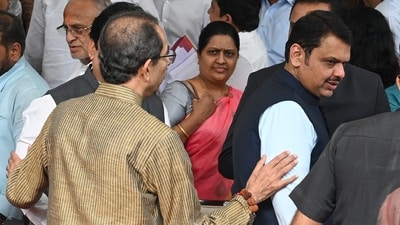 Uddhav Thackeray (back to camera) interacting with CM Devendra Fadanvis during a photoshoot at a farewell function for the leader of opposition in the legislative council, Amabdas Danve, on July 16. (Raju Shinde/HT Photo) Uddhav Thackeray (back to camera) interacting with CM Devendra Fadanvis during a photoshoot at a farewell function for the leader of opposition in the legislative council, Amabdas Danve, on July 16. (Raju Shinde/HT Photo)