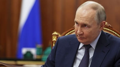 Russian President Vladimir Putin speaks with Alexander Avdeyev, the governor of Vladimir region, during their meeting at the Kremlin in Moscow (AP) Russian President Vladimir Putin speaks with Alexander Avdeyev, the governor of Vladimir region, during their meeting at the Kremlin in Moscow (AP)