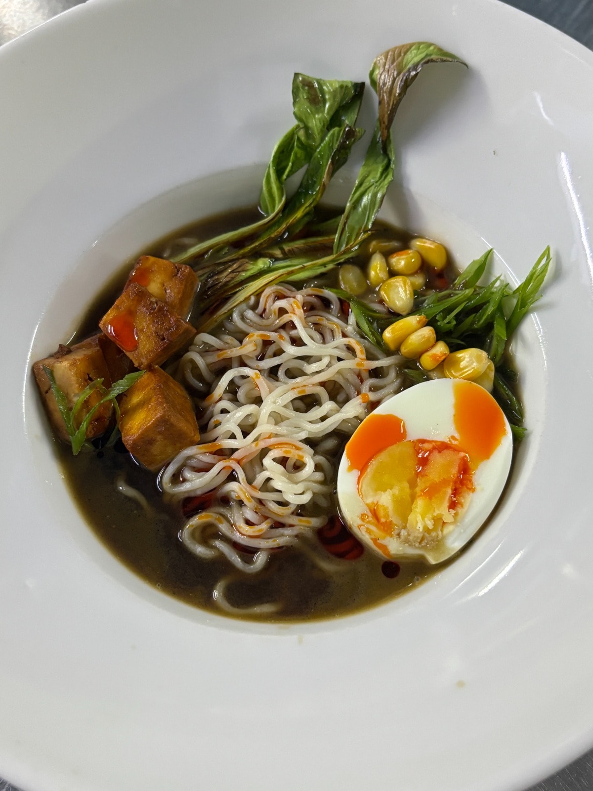 Spicy soya tofu ramen is rich in umami flavours. (PC: The Ashok) Spicy soya tofu ramen is rich in umami flavours. (PC: The Ashok)