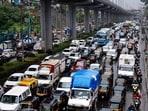 Vehicles stuck in a traffic jam on Western Express Highway following rain, in Mumbai on Tuesday. Vehicles stuck in a traffic jam on Western Express Highway following rain, in Mumbai on Tuesday.