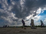 Children playing in the overcast weather at Yamuna Pusta ground in New Delhi. Children playing in the overcast weather at Yamuna Pusta ground in New Delhi.