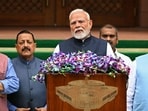India's Prime Minister Narendra Modi (C) addresses the media along with his fellow lawmakers on the first day of the monsoon session of the parliament, in New Delhi on July 21, 2025.