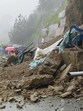 People negotiating debris on foot as a landslide blocked the Tutu-Kunihar road after heavy rain in Solan district on Monday. (HT Photo) People negotiating debris on foot as a landslide blocked the Tutu-Kunihar road after heavy rain in Solan district on Monday. (HT Photo)
