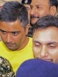 Raipur: Security personnel and others escort Chaitanya Baghel, in yellow, son of former chief minister Bhupesh Baghel, after his arrest by the Enforcement Directorate (ED) in Raipur. (PTI FILE PHOTO) Raipur: Security personnel and others escort Chaitanya Baghel, in yellow, son of former chief minister Bhupesh Baghel, after his arrest by the Enforcement Directorate (ED) in Raipur. (PTI FILE PHOTO)