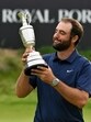 Scottie Scheffler romped to a magnificent four-shot victory to seal his first British Open title at Royal Portrush on Sunday. (AFP) Scottie Scheffler romped to a magnificent four-shot victory to seal his first British Open title at Royal Portrush on Sunday. (AFP)