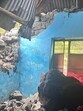 The damaged wall of the Government School in Bhainch panchayat in Poonch district after a boulder came rolling down a hillside amid heavy rain in the area on Monday morning. (HT Photo) The damaged wall of the Government School in Bhainch panchayat in Poonch district after a boulder came rolling down a hillside amid heavy rain in the area on Monday morning. (HT Photo)
