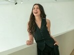 Anne Hathaway is all smiles as she steps in the character of Andy Sachs.