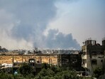 Smoke billows from Israeli bombardment as pictured from Deir el-Balah in the central Gaza Strip on July 21. Smoke billows from Israeli bombardment as pictured from Deir el-Balah in the central Gaza Strip on July 21.
