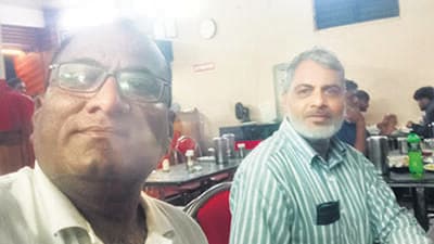 Asif Bashir Khan (right), with his brother, after he was released. Asif Bashir Khan (right), with his brother, after he was released.