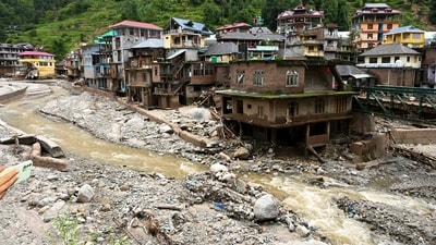 Debris and slit near damaged houses at a flood-affected area, in Mandi district. (PTI) Debris and slit near damaged houses at a flood-affected area, in Mandi district. (PTI)
