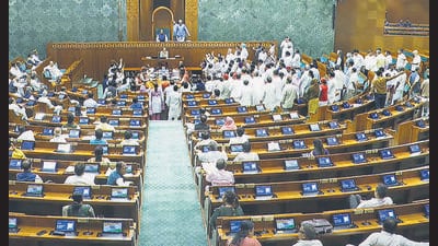 Opposition lawmakers in the Lok Sabha protest seeking a discussion on Operation Sindoor on the first day of the monsoon session of Parliament on Monday. (PTI) Opposition lawmakers in the Lok Sabha protest seeking a discussion on Operation Sindoor on the first day of the monsoon session of Parliament on Monday. (PTI)