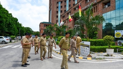Police officials at Sharda University investigating a student's suicide in Greater Noida, India, on Saturday. (Sunil Ghosh / Hindustan Times) Police officials at Sharda University investigating a student's suicide in Greater Noida, India, on Saturday. (Sunil Ghosh / Hindustan Times)