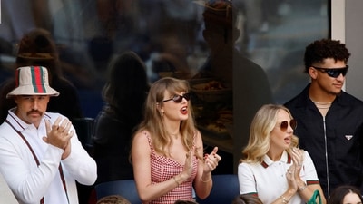 Singer Taylor Swift, Kansas City Chiefs' Travis Kelce, Kansas City Chiefs' Patrick Mahomes and his partner Brittany Mahomes. (REUTERS)