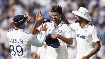 Washington Sundar celebrates with teammates after taking a wicket. (PTI) Washington Sundar celebrates with teammates after taking a wicket. (PTI)