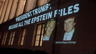 An image of US President Donald Trump and Jeffrey Epstein, along with the words "President Trump: Release All the Epstein Files", is projected onto the U.S. Department of Commerce headquarters on July 18, 2025, in Washington, DC (AFP) An image of US President Donald Trump and Jeffrey Epstein, along with the words "President Trump: Release All the Epstein Files", is projected onto the U.S. Department of Commerce headquarters on July 18, 2025, in Washington, DC (AFP)