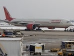 An Air India Boeing 777-300ER plane is towed at O'Hare International Airport in Chicago, Illinois, United States.