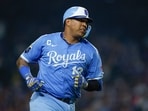  Kansas City Royals catcher Salvador Perez (13) rounds the bases after hitting a two-run home run against the Chicago Cubs during the eight inning at Wrigley Field.
