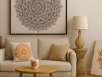 A cosy living room styled with Mandala art, featuring a striking wall painting, printed cushion, and an unfinished canvas with paints, creating a warm, creative and calming vibe.
